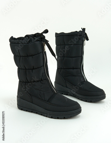 Long women's boots. On a white background. side view.