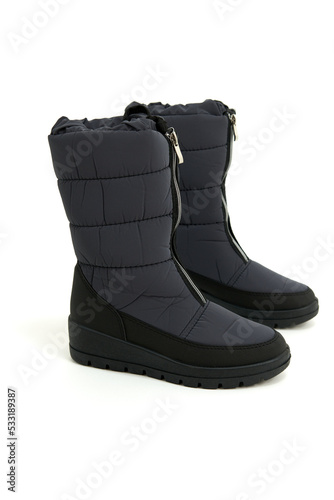 Long women's boots. On a white background. side view.