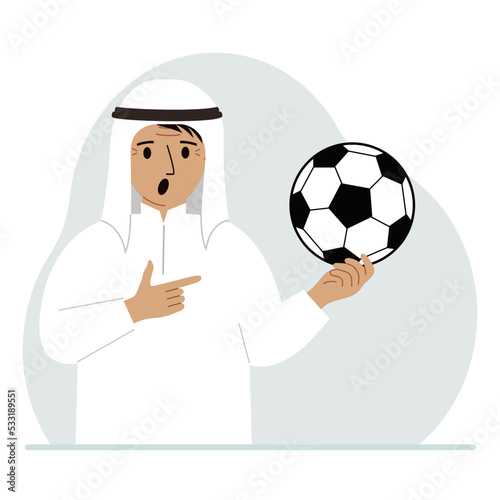 A man holds a soccer ball in his hand. The concept of a player, fan or coach.
