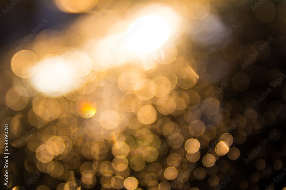 Obraz premium gold bokeh with black background