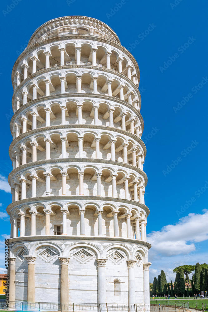 The Leaning Tower of Pisa  is a medieval structure, famous for the settling of its foundations, which caused it to lean 5.5 degrees The bell tower was built in 1173 in white marble, Italy, 2019