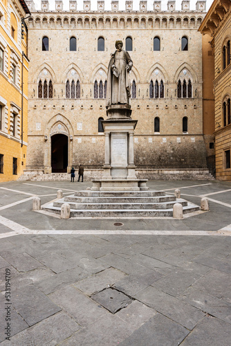 Monument to Sallustio Bandini, Italian archdeacon and politician. Its statue was built in 1880 at Piazza Salimbeni, by Italian sculptor Tito Sarrocchi. Siena, Italy, 2019