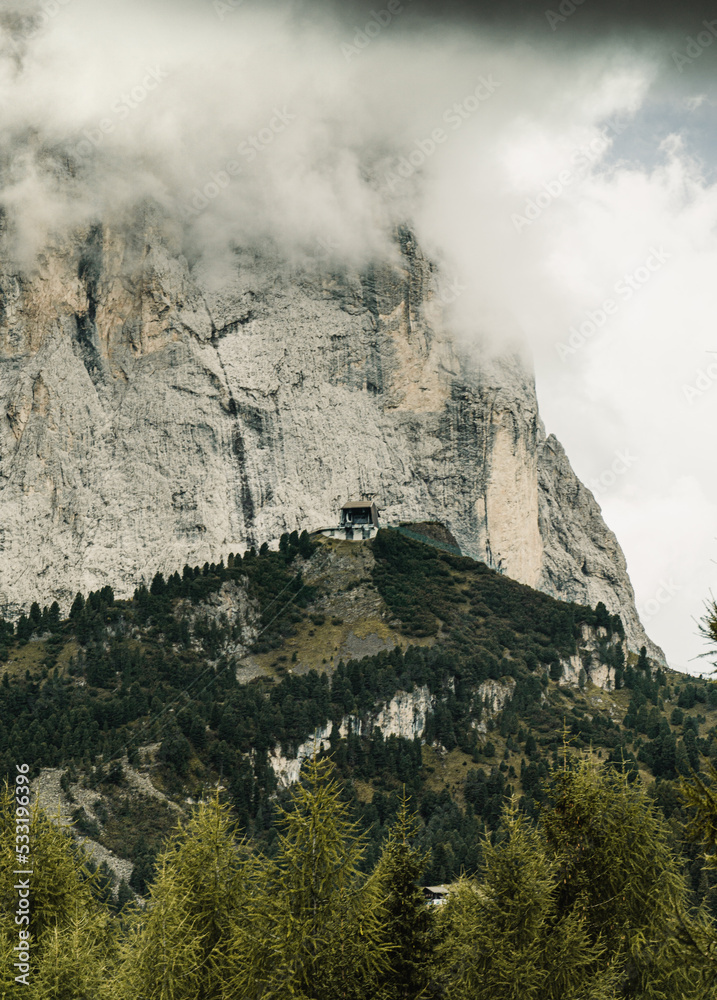 house and dolomites