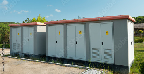 Outdoor electrical cabinets. Control boards inside the parking area