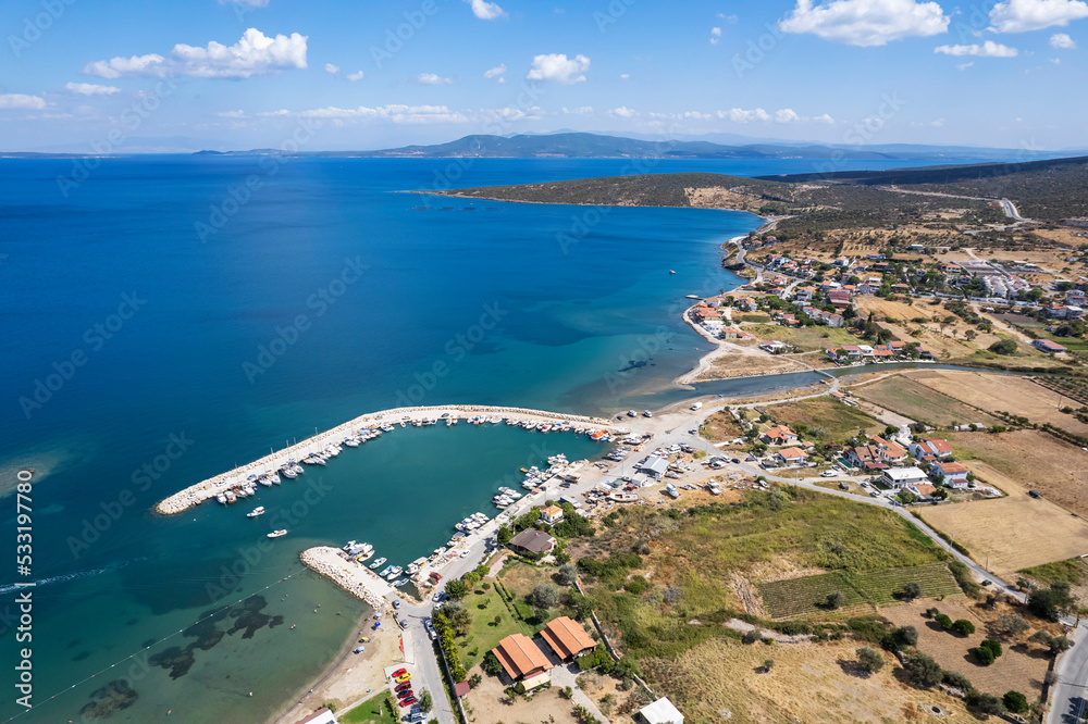 A distant view of Urla Balıklıova, formerly called Polikhne and located in İzmir, the pearl of the Aegean region. Drone view of Balikliova, Urla  Izmir. Turkey