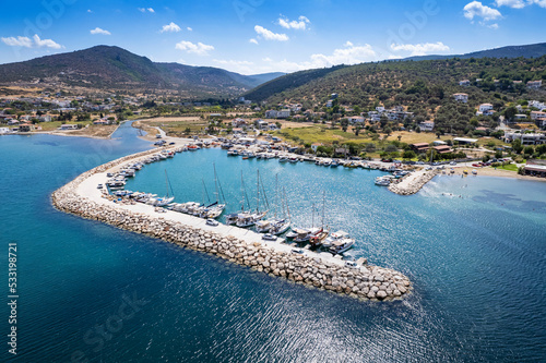 Fototapeta Naklejka Na Ścianę i Meble -  A distant view of Urla Balıklıova, formerly called Polikhne and located in İzmir, the pearl of the Aegean region. Drone view of Balikliova, Urla  Izmir. Turkey