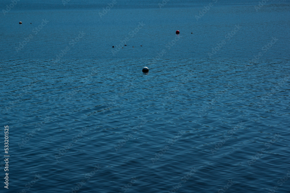 buoy on a calm blue water