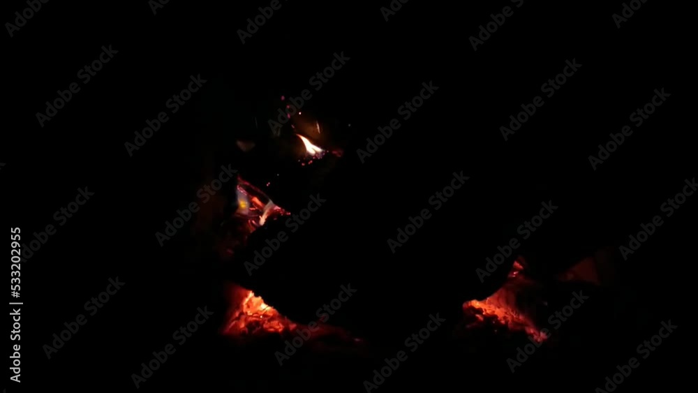 The fireplace is burning in the bathroom. The fireplace is burning in the bathroom.