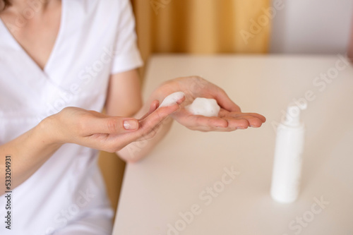 Foam for washing applied to women s hands