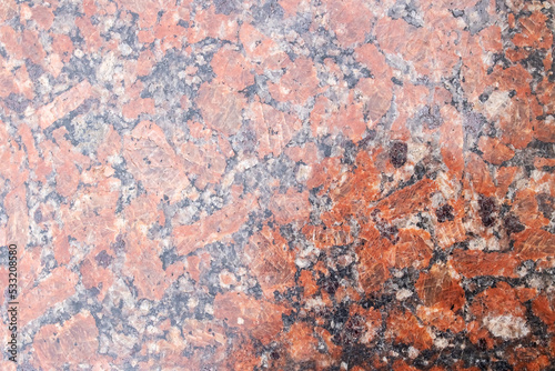 Red marble background or texture close up