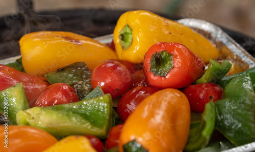 Grilled vegetables. Healthy grilling food, colorful peppers and grilled tomatoes. Colorful tasty and healthy vegetables.