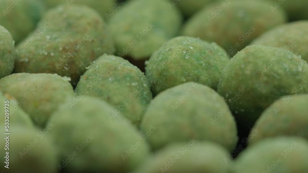 nuts with wasabi rotate in a circle. spicy snack nuts with wasabi rotate in a circle. spicy snack