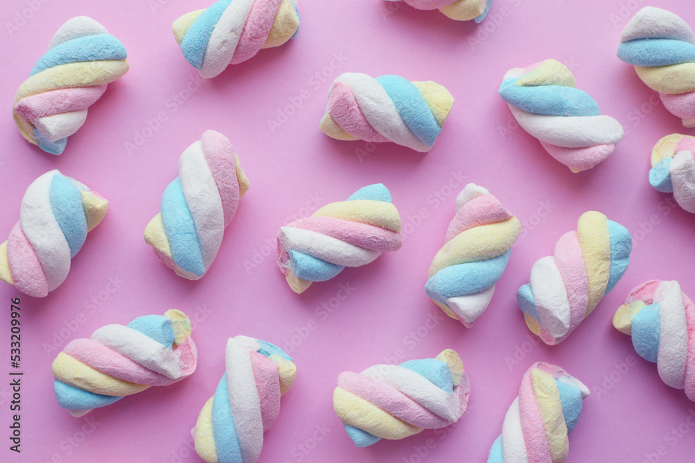 Marshmallow. Close-up of colorful gummies on a pink background. Candies Marshmallow. Close-up of colorful gummies on a pink background. Candies