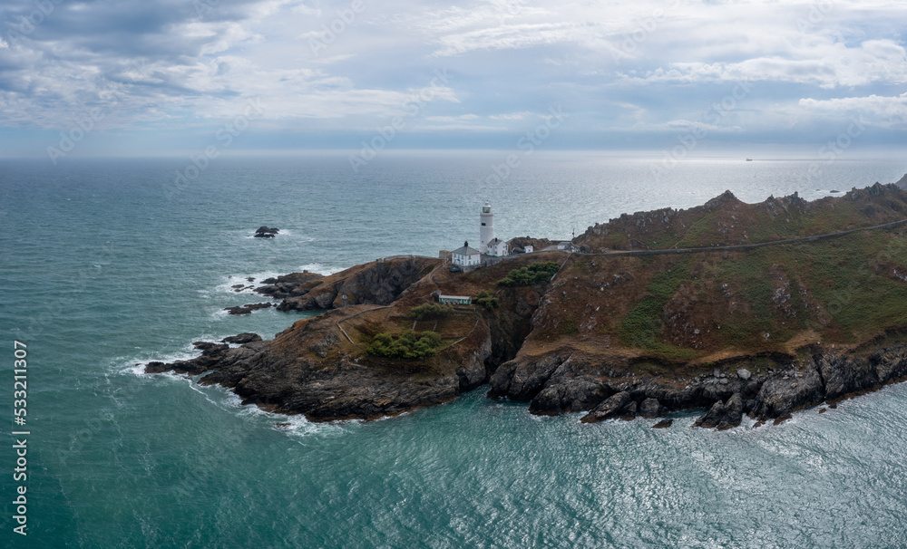 landscape view of the Start Point Lighthouse and headland in South Devon on the English Channel landscape view of the Start Point Lighthouse and headland in South Devon on the English Channel
