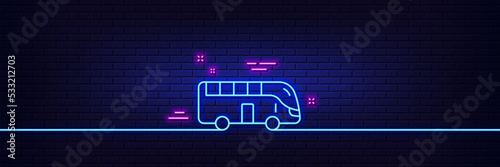 Neon light glow effect. Bus tour transport line icon. Transportation sign. Tourism or public vehicle symbol. 3d line neon glow icon. Brick wall banner. Bus tour outline. Vector