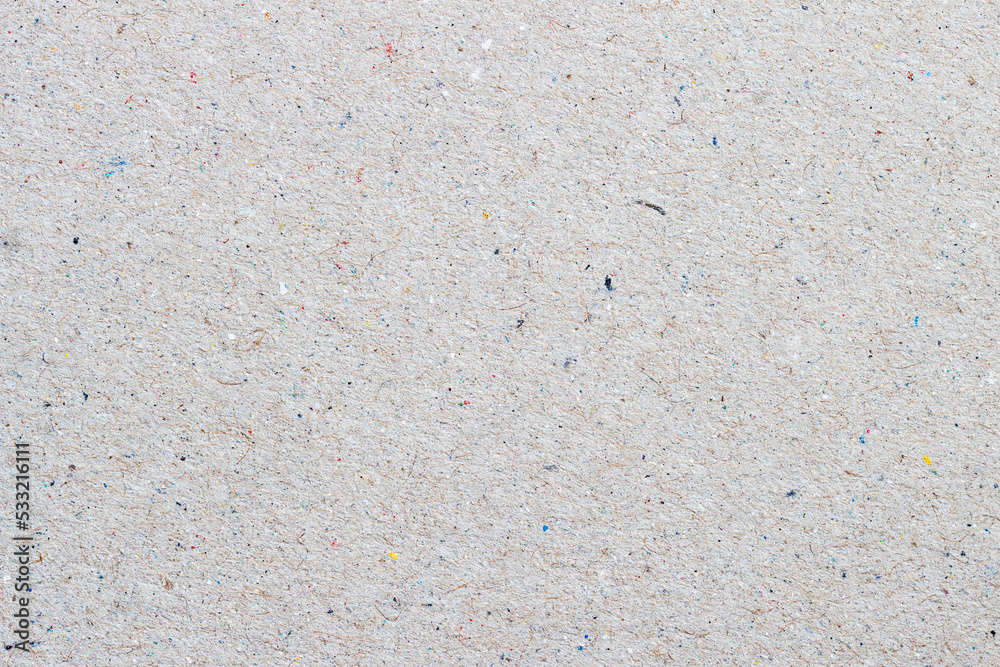 Craft paper texture cardboard background with small inclusions of cellulose Craft paper texture cardboard background with small inclusions of cellulose