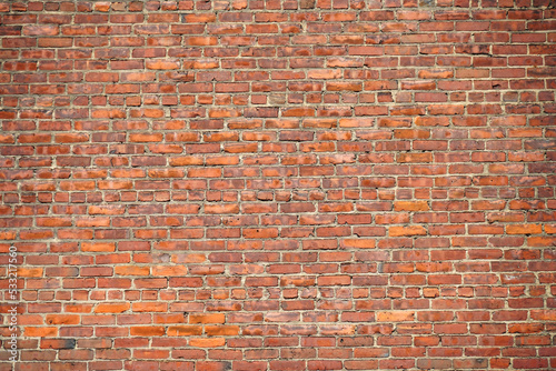 facade view of old grunge brick wall background