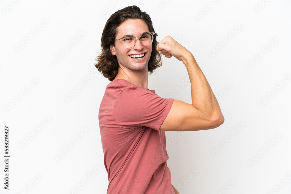 Young handsome man isolated on white background doing strong gesture Young handsome man isolated on white background doing strong gesture