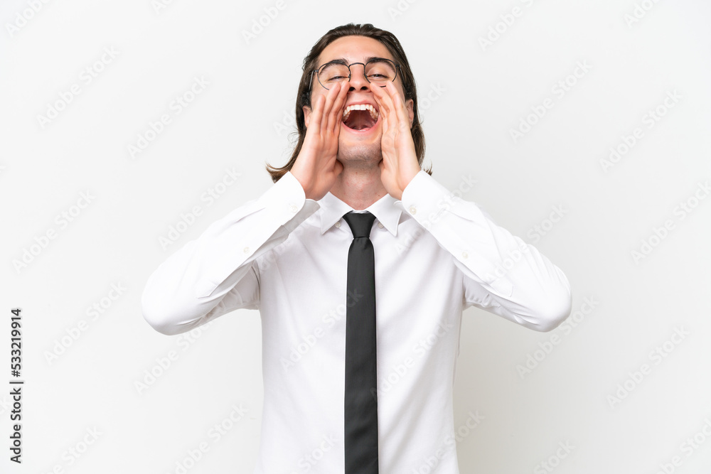 Business handsome man isolated on white background shouting and announcing something Business handsome man isolated on white background shouting and announcing something