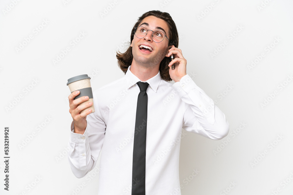 Business handsome man isolated on white background holding coffee to take away and a mobile Business handsome man isolated on white background holding coffee to take away and a mobile