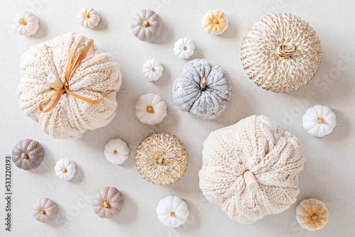 Hobby background with handmade pumpkins. DIY, craft decoration for fall and winter holidays. Flat lay, top view, banner