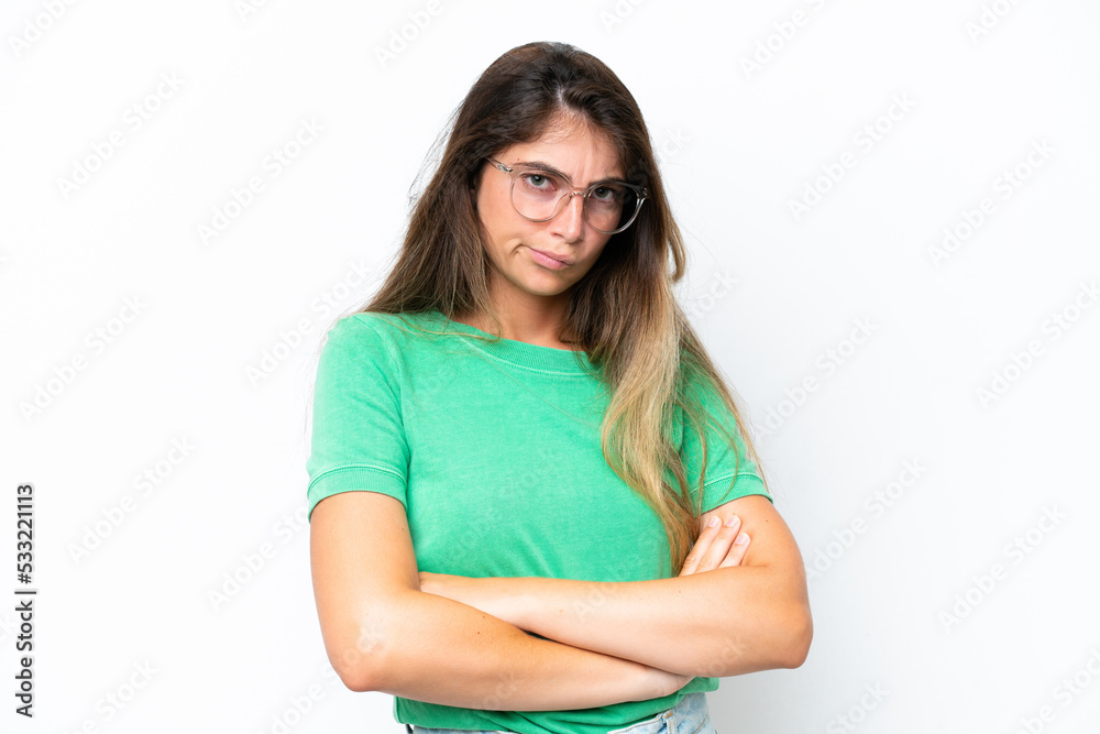 Young caucasian woman isolated on white background with unhappy expression