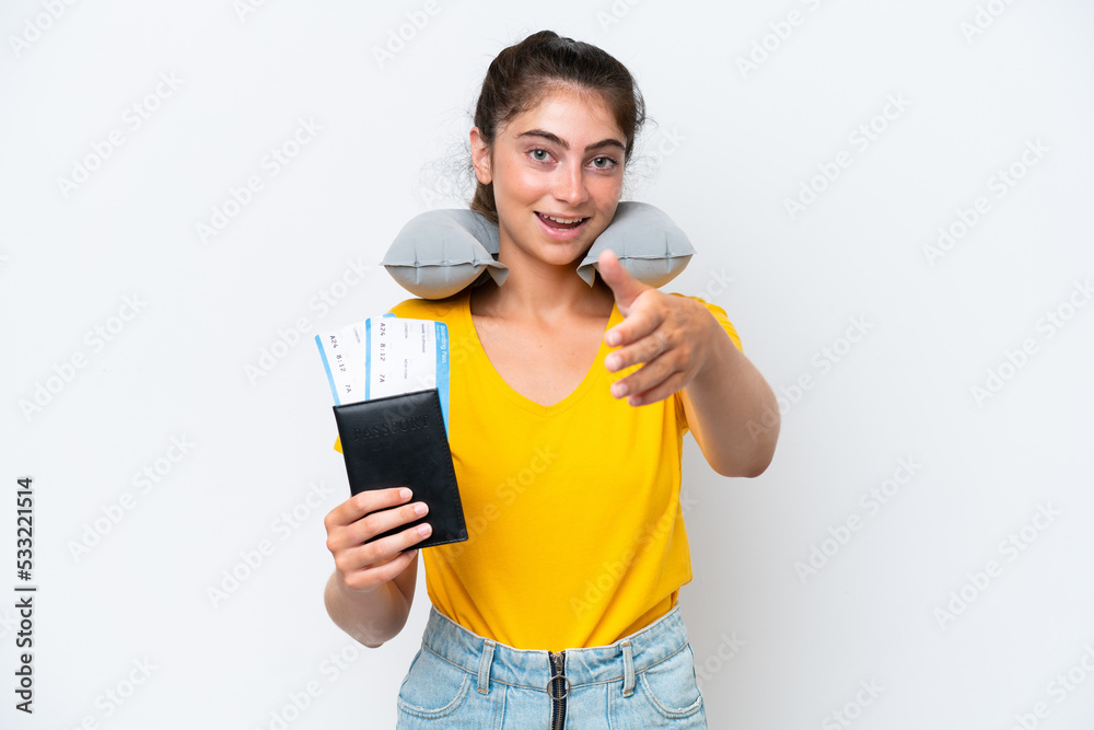 Young caucasian woman with Inflatable travel pillow isolated on white background shaking hands for closing a good deal Young caucasian woman with Inflatable travel pillow isolated on white background shaking hands for closing a good deal