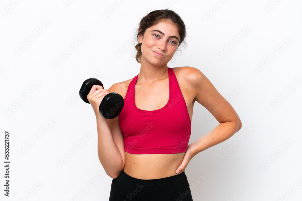 Young sport caucasian woman making weightlifting isolated on white background suffering from backache for having made an effort Young sport caucasian woman making weightlifting isolated on white background suffering from backache for having made an effort