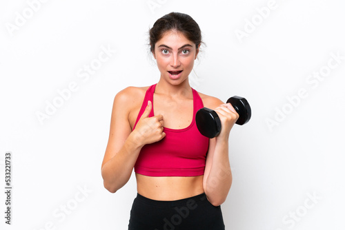 Young sport caucasian woman making weightlifting isolated on white background with surprise facial expression