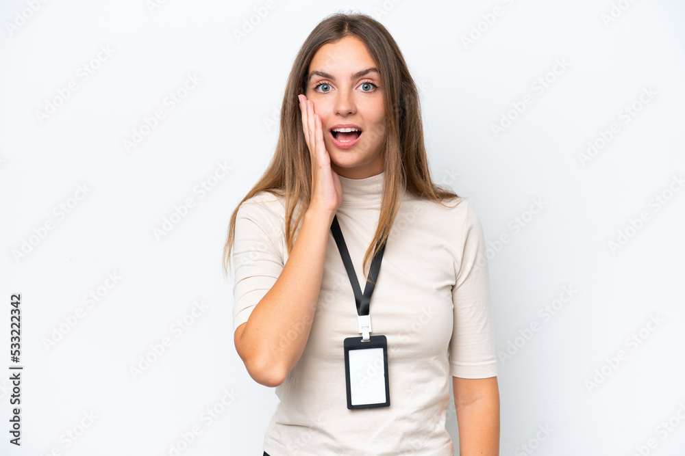 Young pretty woman with ID card isolated on white background with surprise and shocked facial expression Young pretty woman with ID card isolated on white background with surprise and shocked facial expression