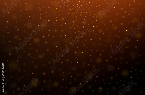 Gold particles on a dark background