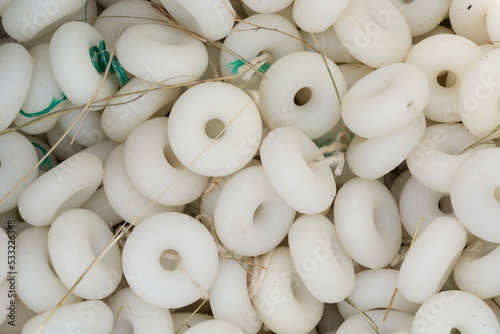 close up of white fishing net floats
