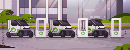 little smart electric cars charging parking at the charger station with a plug in cable electrified transportation e-motion
