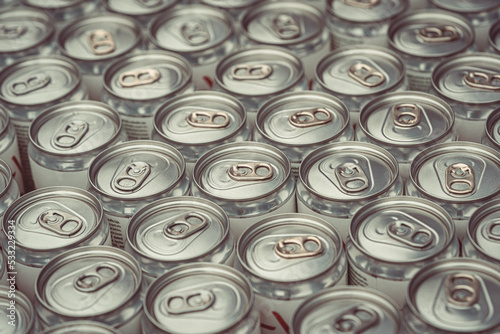 Bunch of aluminum beverage cans , vertical image.