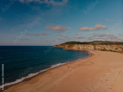 Panoramic view of the coast with cliffs overlooking the seaduring a surf and travel week experience in Somo, Cantabria (Spain)