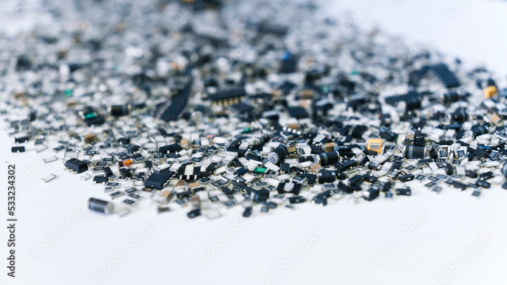 Abstract indoor shot of various scattered electronic parts in the shades of black placed together in stack. Modern technology concept. High quality photo Abstract indoor shot of various scattered electronic parts in the shades of black placed together in stack. Modern technology concept. High quality photo