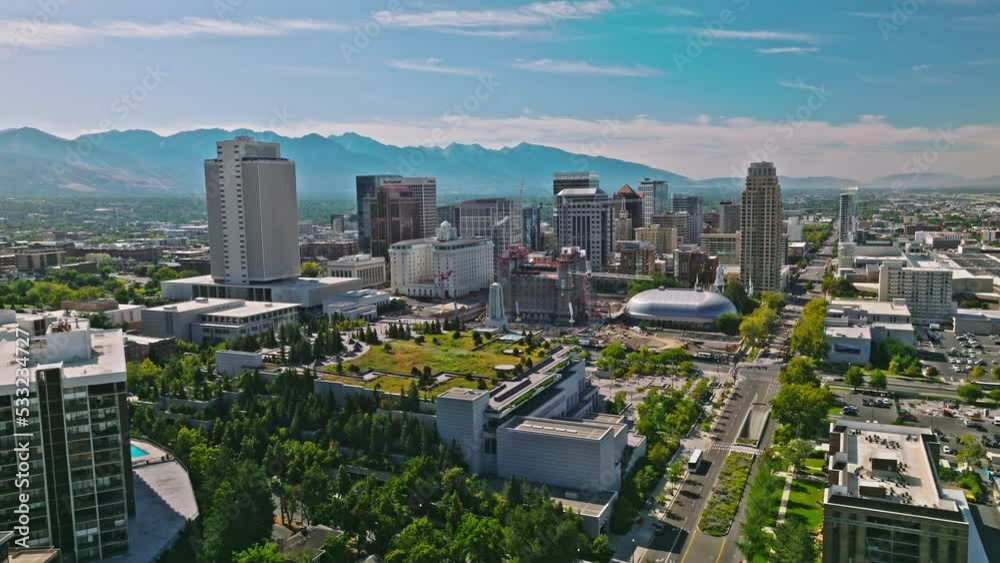 Salt Lake City Utah Skyline at Day, Mountains Behind, Aerial Drone