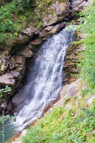 waterfall in the mountains of the mountain river