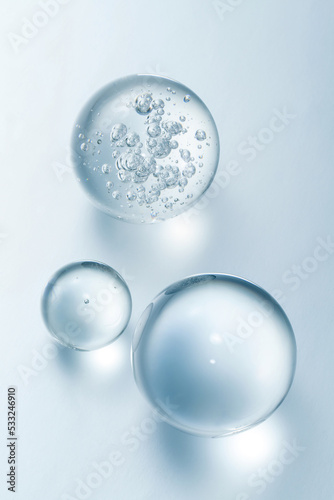 glass ball with bubbles. abstract background for cosmetics.