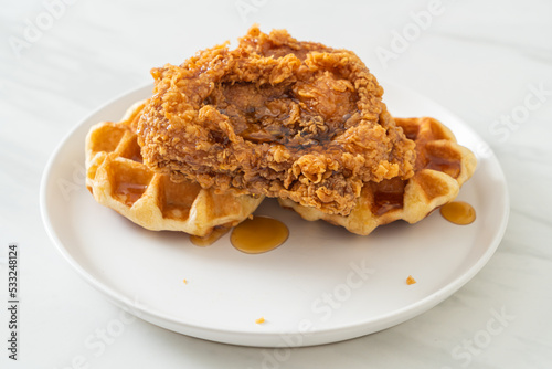 fried chicken waffle with honey or maple syrup