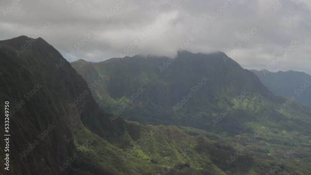 Time-lapse aerial view from the top of the Koolau mountain range with clouds shadow. Oahu, Hawaii Time-lapse aerial view from the top of the Koolau mountain range with clouds shadow. Oahu, Hawaii