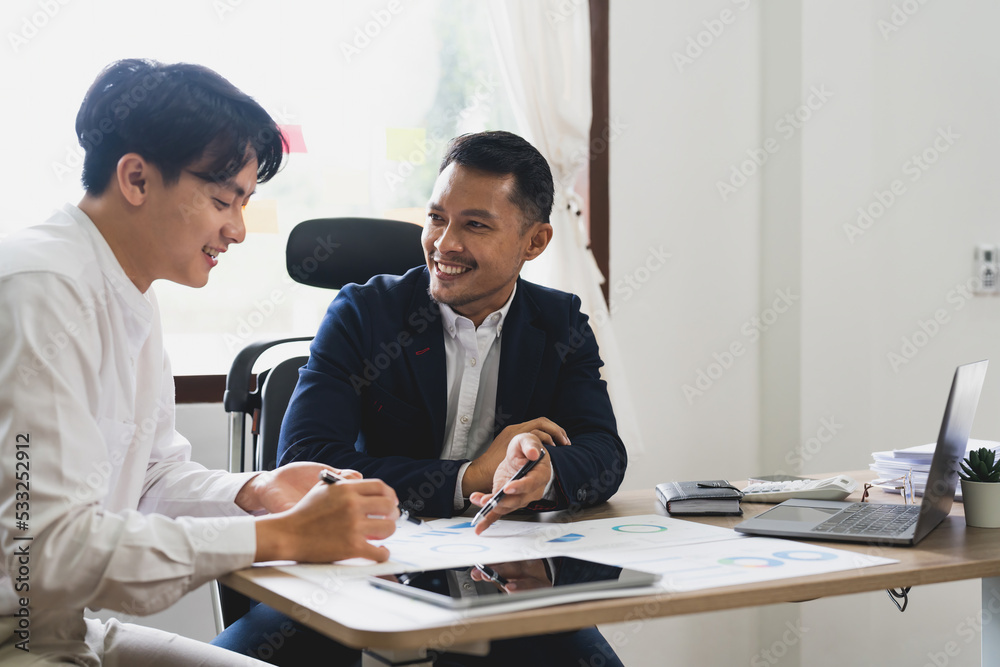 Asian business adviser meeting to analyze and discuss the situation on the financial report. Investment Consultant, Financial advisor and accounting concept. Asian business adviser meeting to analyze and discuss the situation on the financial report. Investment Consultant, Financial advisor and accounting concept.