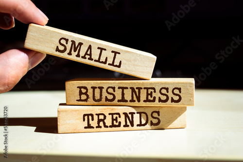 Wooden blocks with words 'Small Business Trends'.