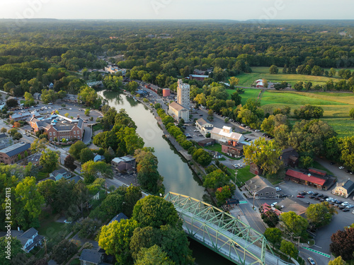 Early evening aerial photo of Schoen Place and the Erie Canal in the Village of Pittsford, New York. 