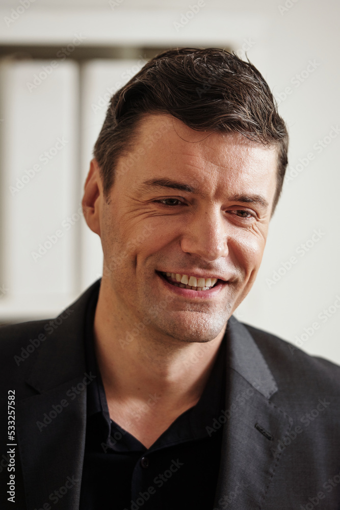 Portrait of Smiling Businessman Portrait of Smiling Businessman