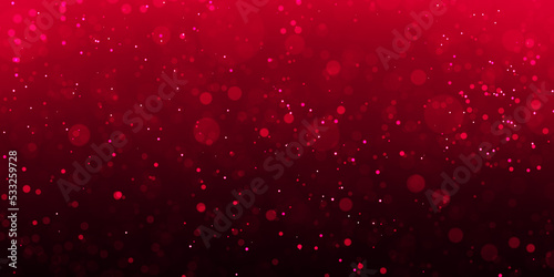 abstract red background with falling glitter particles. Beautiful festive sparkling luxury background.  Background of red particles on a black background.
