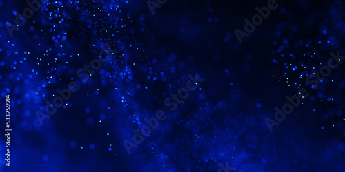 Abstract particle background. Blue dots background. Dust particles. abstract background with blue particles on black. Glowing magical lights, sparkling glittering effect.