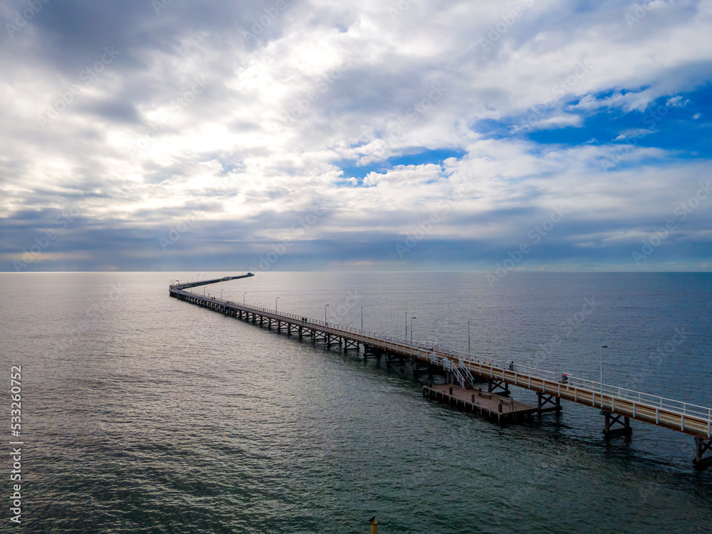 Aerial view of Busselton Jetty the longest timber-piled jetty in the southern hemisphere at 1,841 metres long.