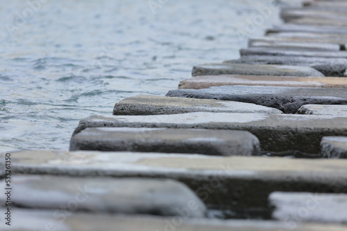 Landmark of Woldaecheon Stream in Jeju Island. stepping stone photo