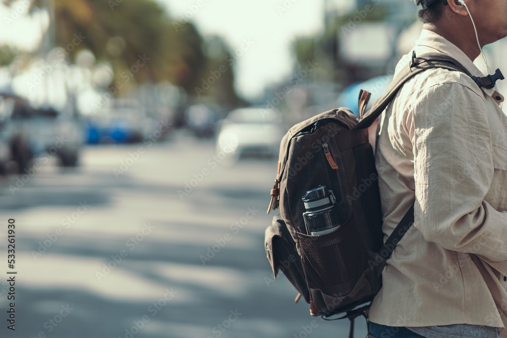 tourists are carrying bags. Backpacker and travel concept.. tourists are carrying bags. Backpacker and travel concept..